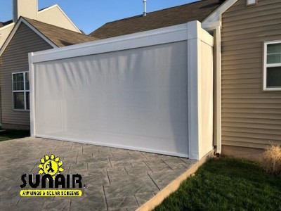 A white Awning covering the entrance to the garage